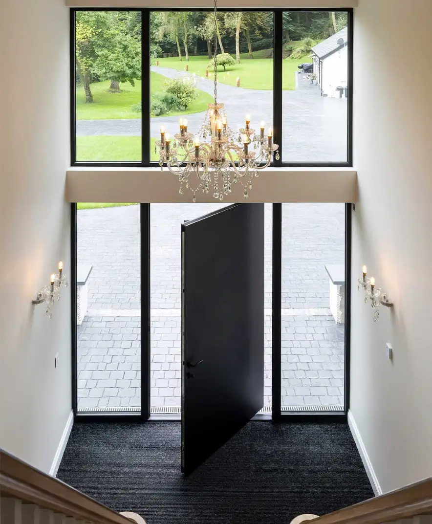 an open steel for leading up to the entrance of the house