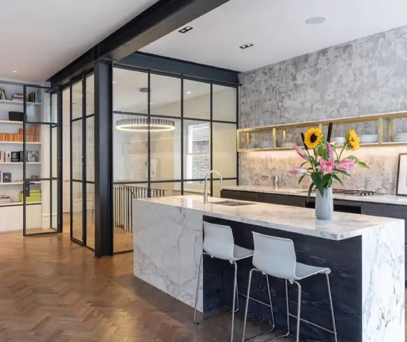 beautiful looking kitchen that has aluminium doors